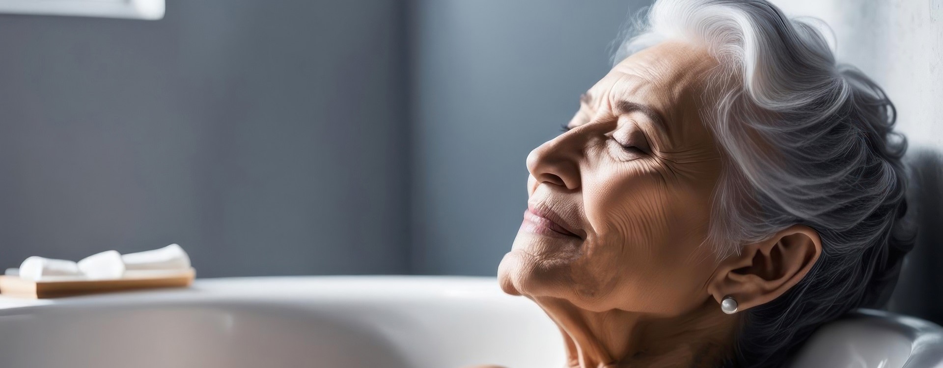 Elderly lady enjoying her bath with copy space